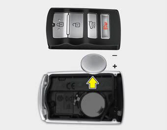 1.Pry open the smart key center cover.