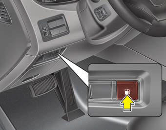 The fuel filler lid must be opened from inside the vehicle by pushing the fuel