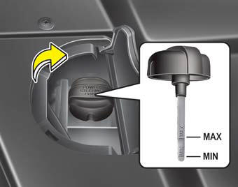 With the vehicle on level ground, check the fluid level in the power steering